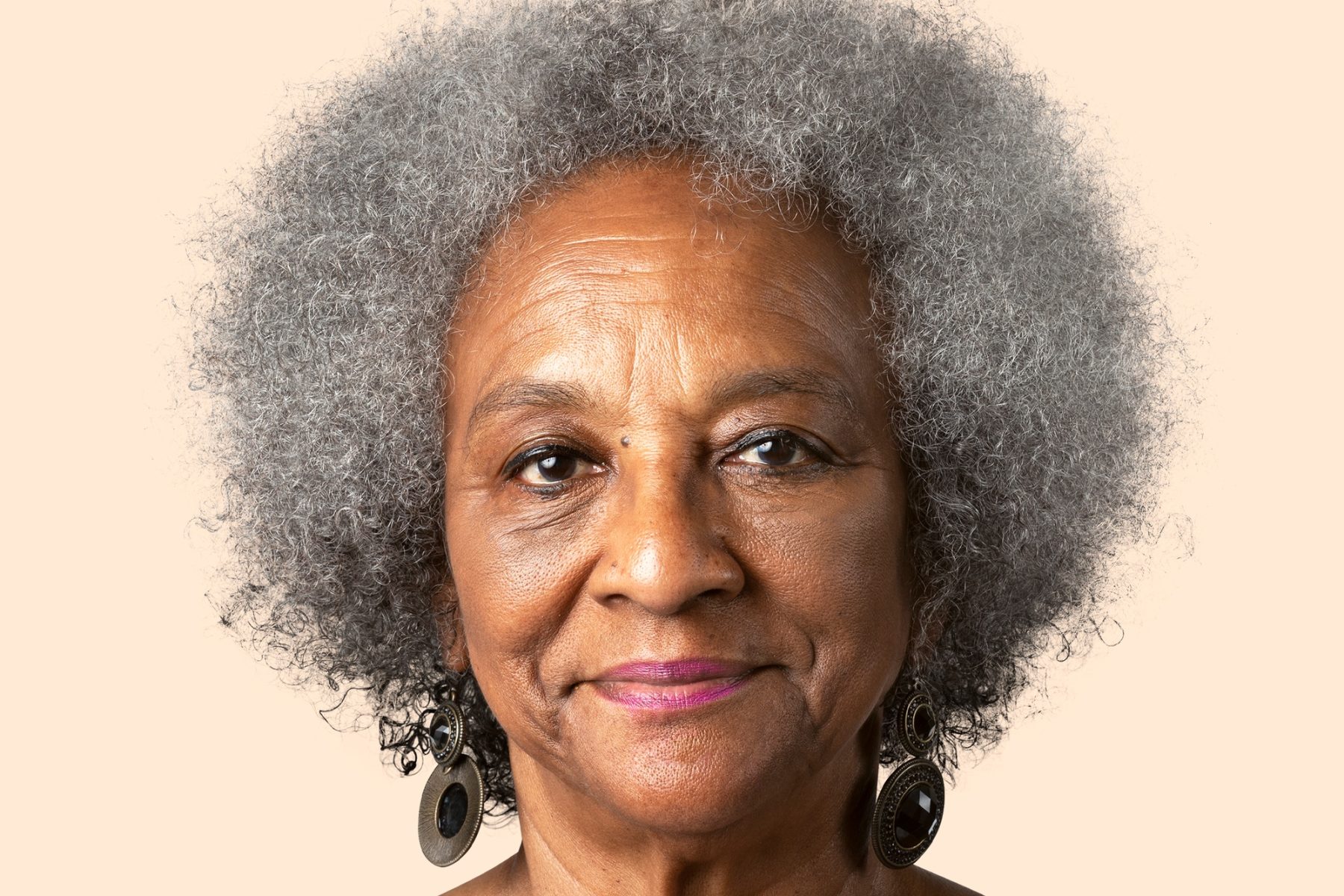 Smiling African senior woman, face portrait